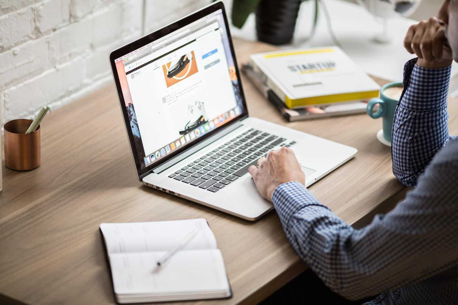 Man looking at laptop