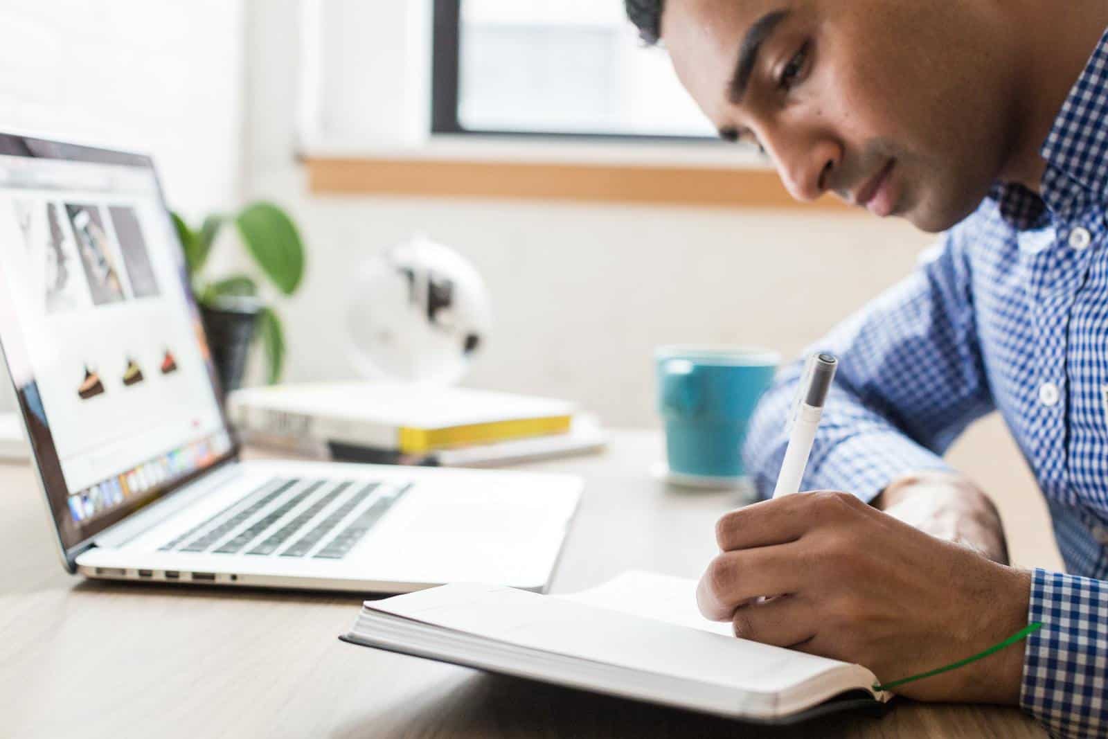 Man writing things down