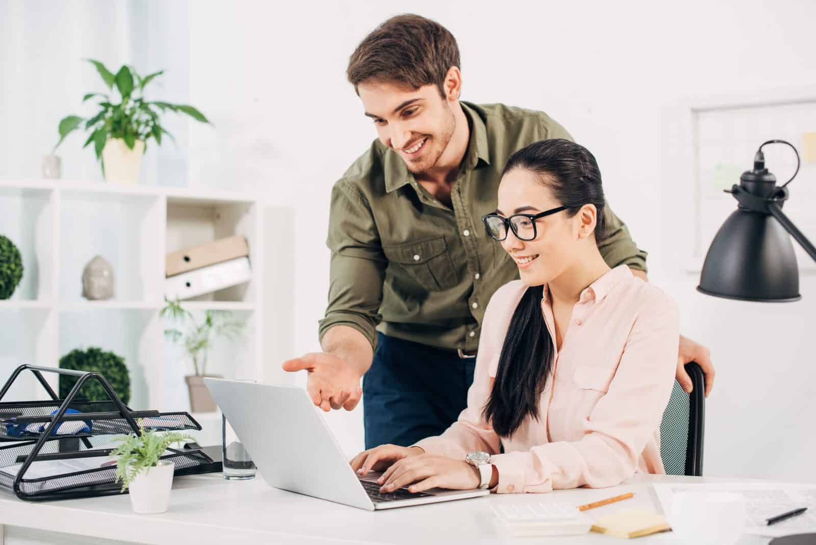 Man pointing at laptop