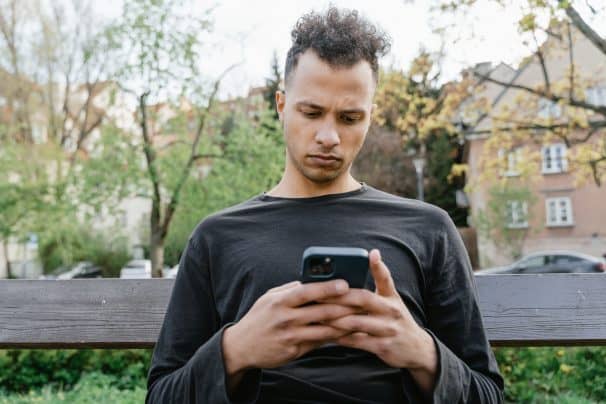 male using cellphone